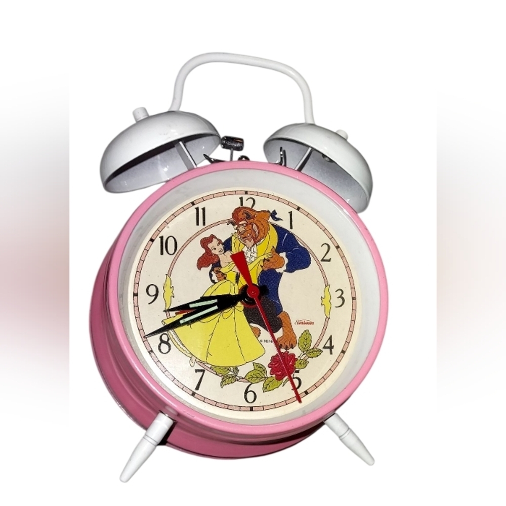 Vintage Disney's Beauty and the Beast double-bell alarm clock made by Sunbeam.